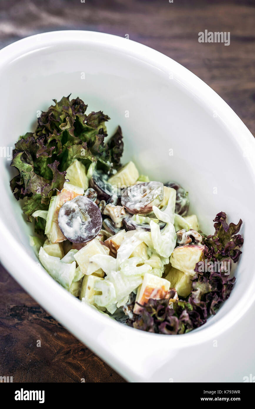 fresh gourmet apple celery and grape salad with yoghurt dressing Stock Photo