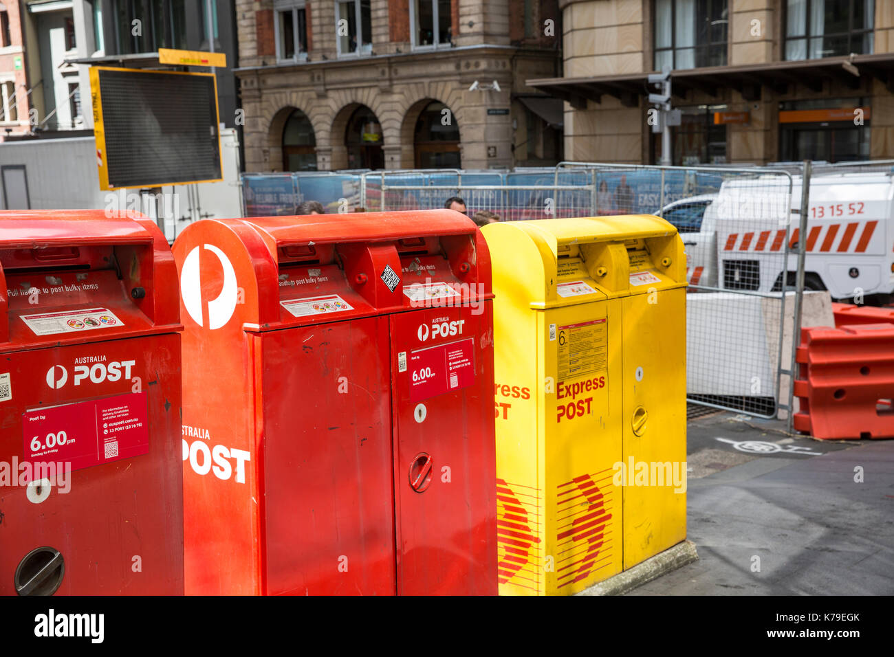 Australia Post mail letter boxes in Sydney city centre, the yellow box is for Express postage
