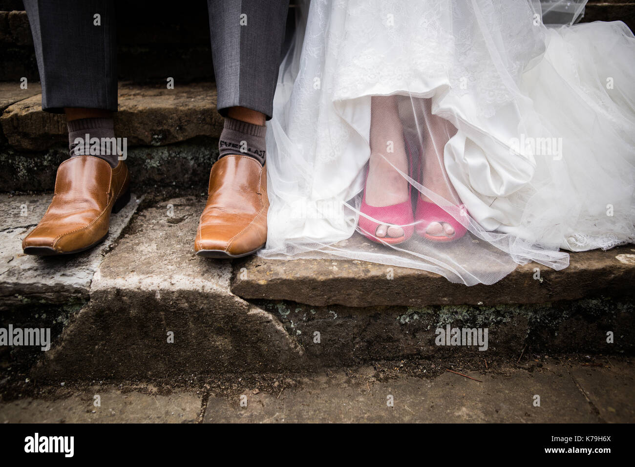 Bride and groom cool shoes Stock Photo