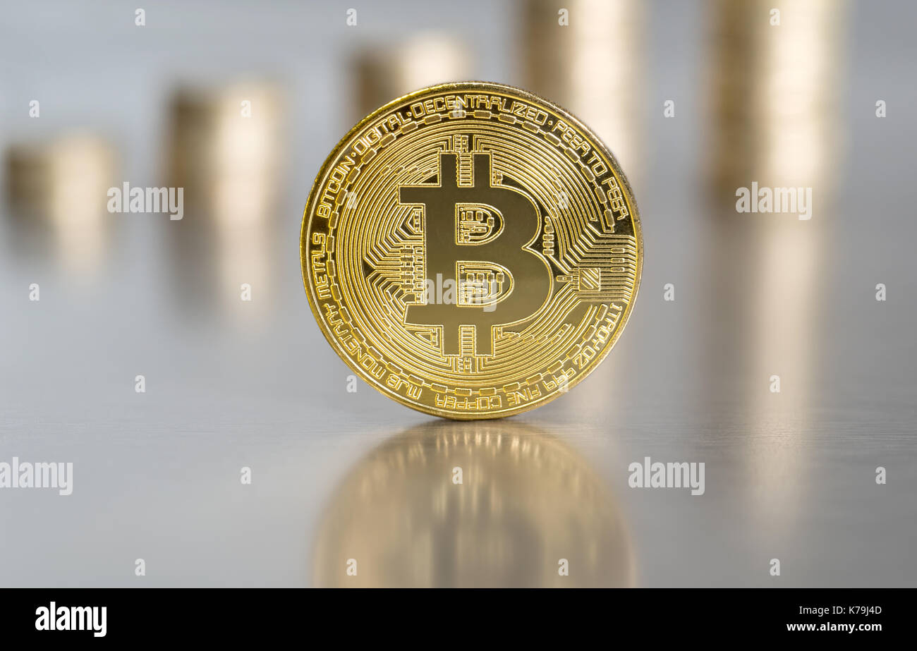 Crypto currency concept - Bitcoin with coin stacks Stock Photo