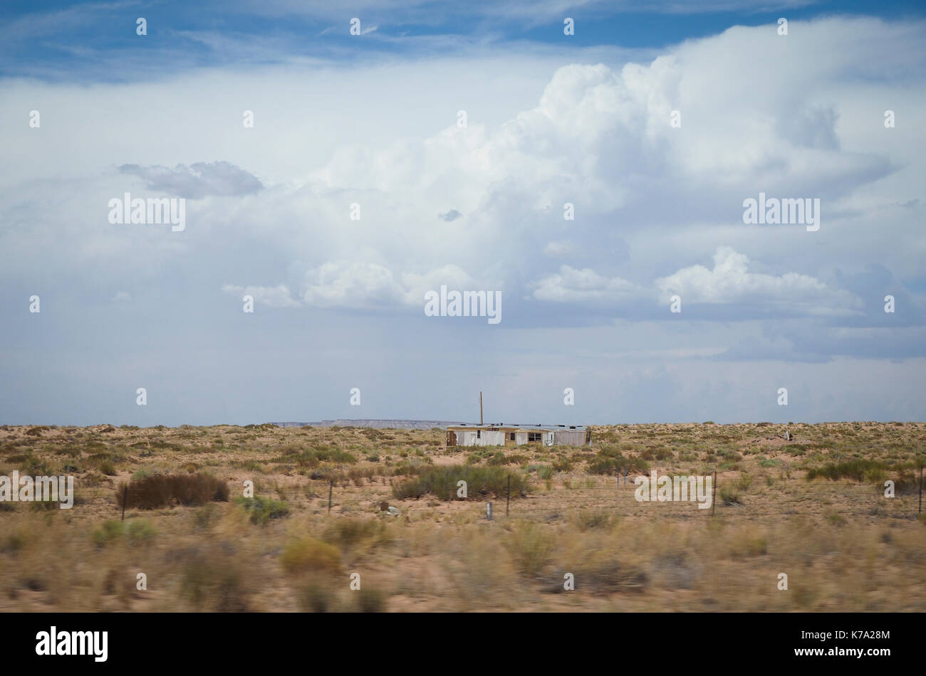 Kayenta, AZ - 25 July 2016: Rural housing estate of Native Americans at the Navajo reservation (Navajo Nation) in the Arizona desert. With a populatio Stock Photo