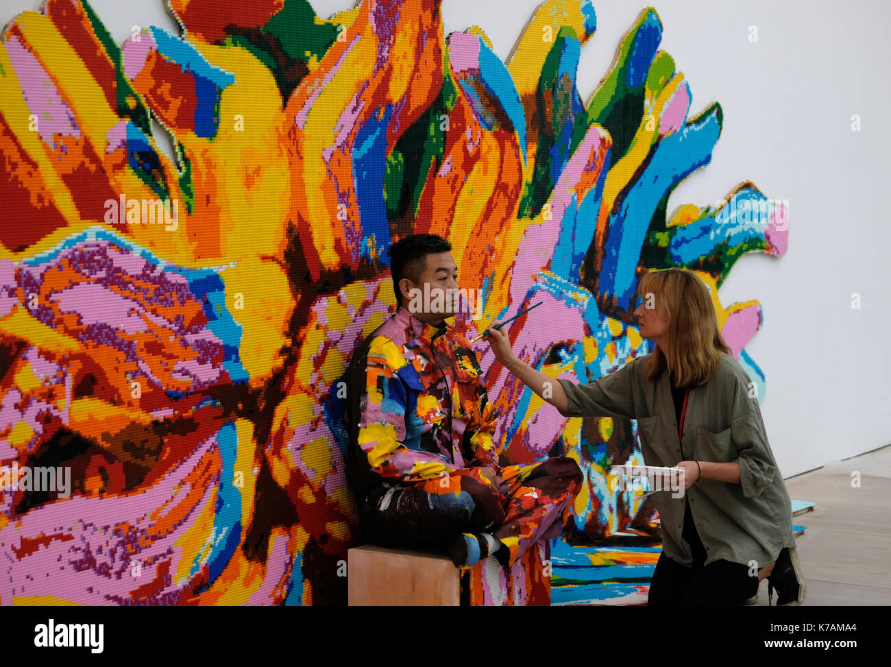 London, UK. 15th Sep, 2017. Chinese artist Liu Bolin mid-way through his first live UK performance The Disappearing Act, until Sunday 17 September at START Art Fair in London’s Saatchi Gallery Credit: Londonphotos/Alamy Live News Stock Photo