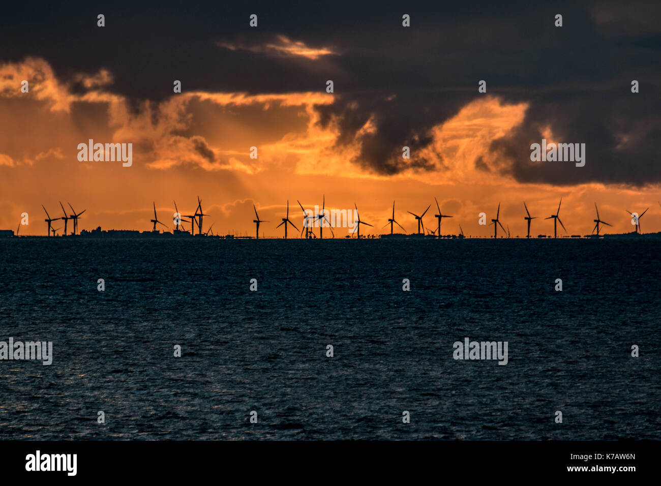 Barrow Windform, Irish Sea. 15th Sep, 2017. UK Weather. The Sun sets behind Barrow Wind farm off Walney Island Credit: David Billinge/Alamy Live News Stock Photo