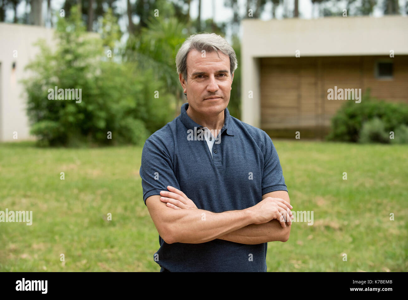 Mature man standing outoors, portrait Stock Photo