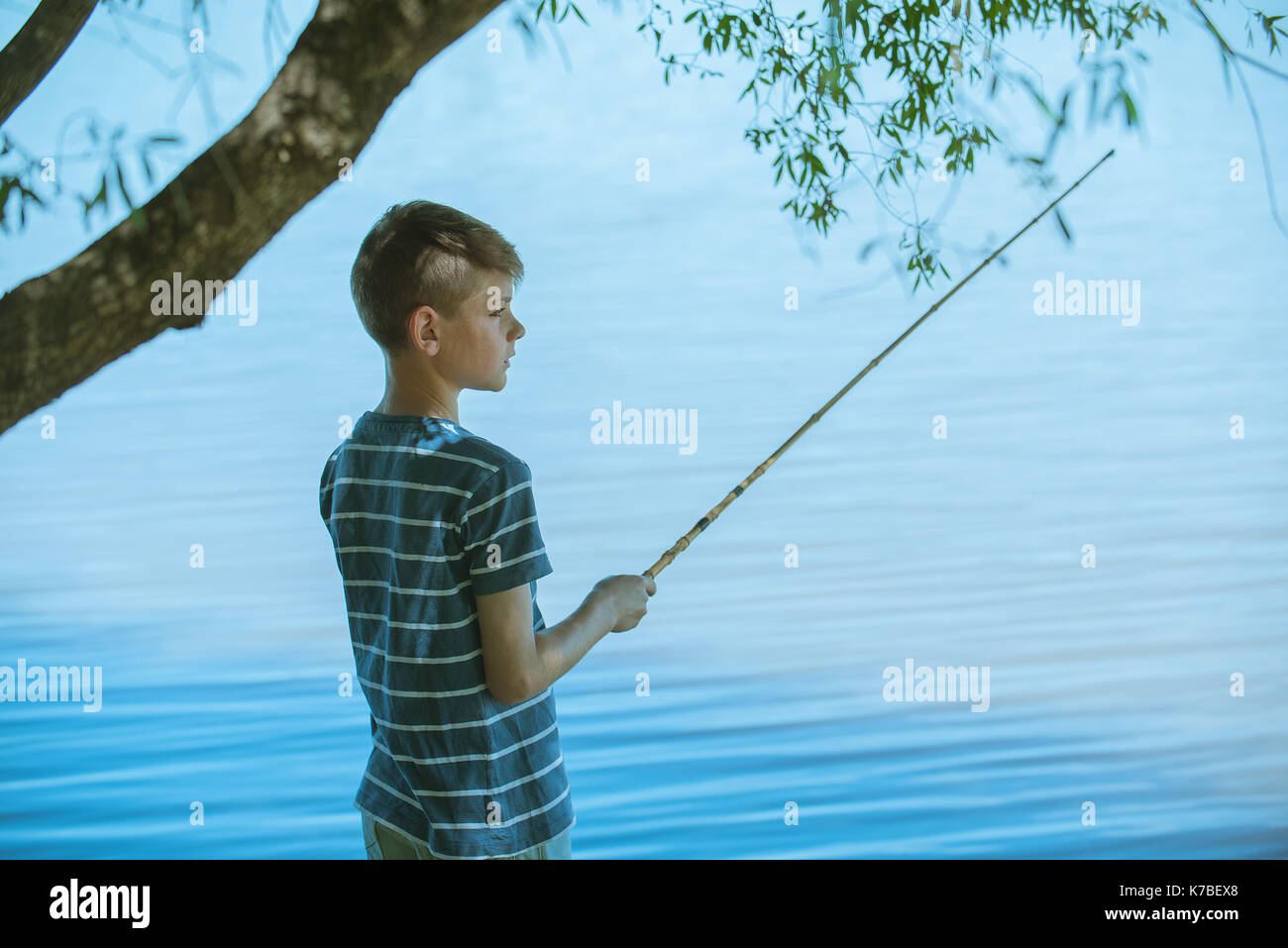 Boy fishing hi-res stock photography and images - Alamy