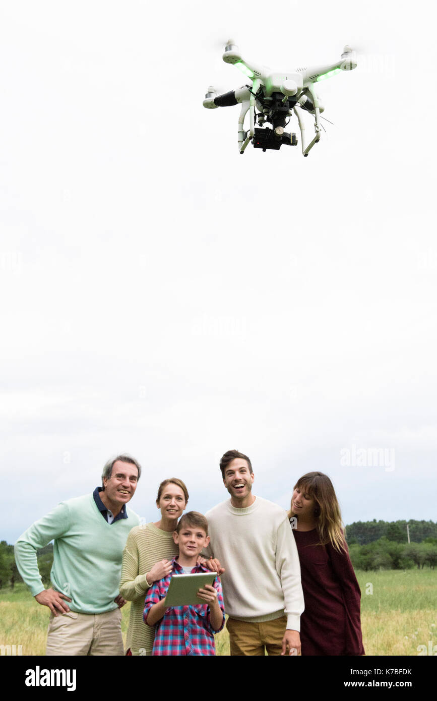 Family playing with drone together Stock Photo - Alamy