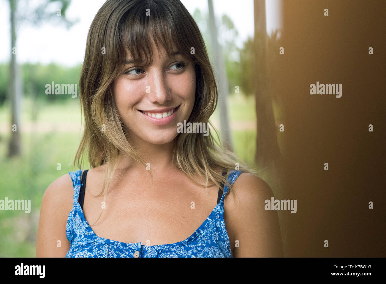 Woman smiling outdoors portrait hi-res stock photography and images - Alamy