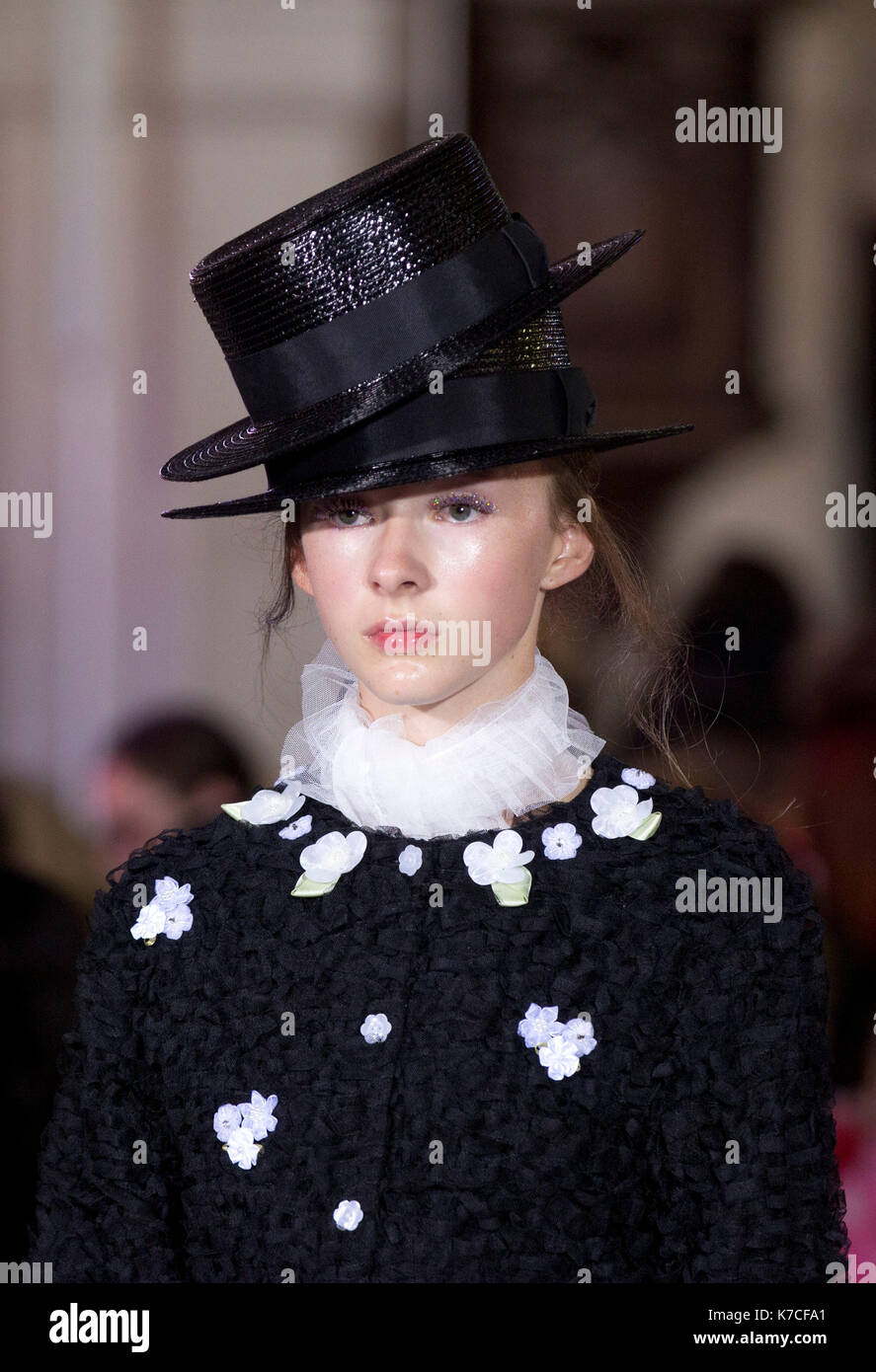Models on the catwalk during the Ryan LO London Fashion Week SS18 show held at St Sepulchre-without-Newgate Church, London. Stock Photo