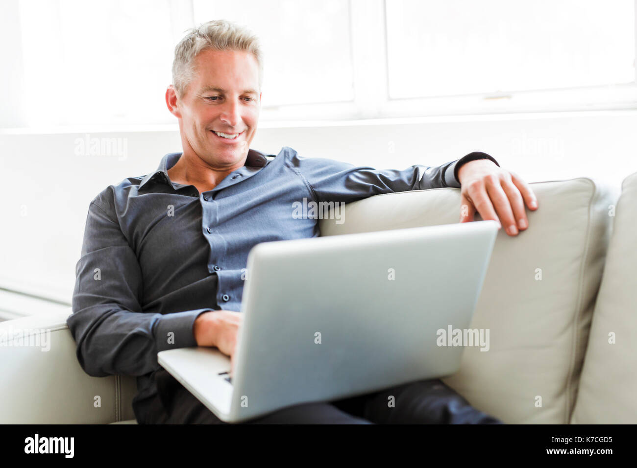 Portrait mature man reclining hi-res stock photography and images - Alamy