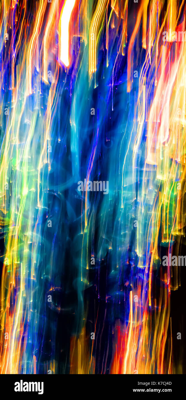 Abstract photo of cascading color lights in motion. Stock Photo