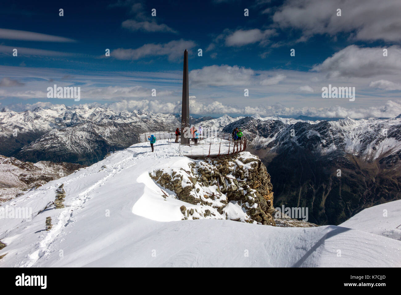 Hikers at snowy viewpoint, Schwarze Schneid cable car, Solden, Austria Stock Photo