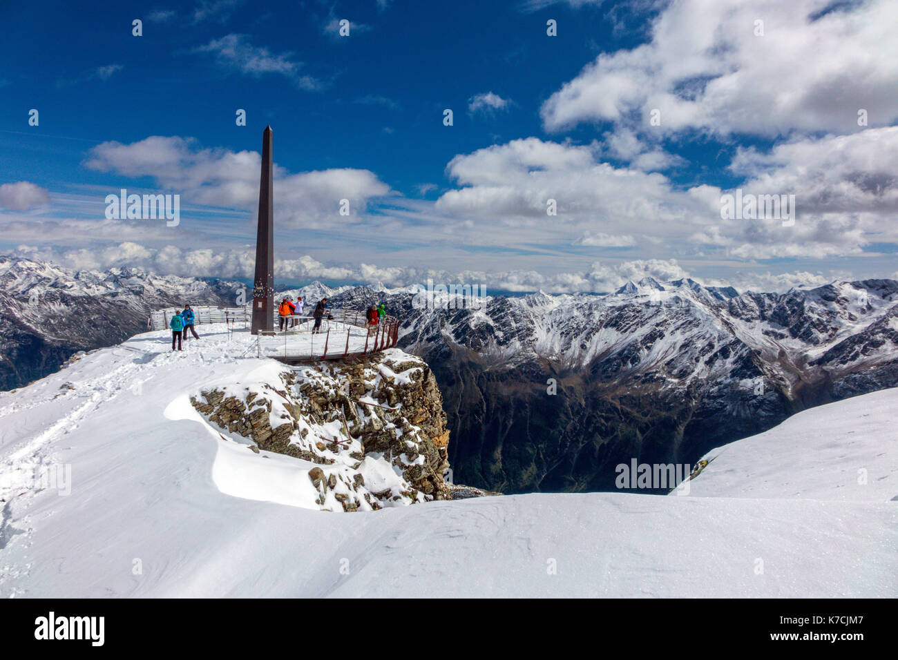 Hikers at snowy viewpoint, Schwarze Schneid cable car, Solden, Austria Stock Photo