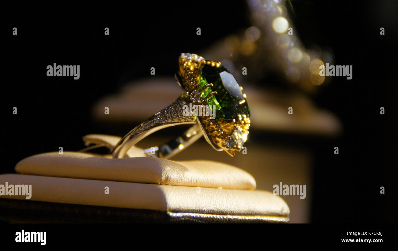 Jewelry with emeralds and diamond. Gemstones. Gold ring with emerald ...
