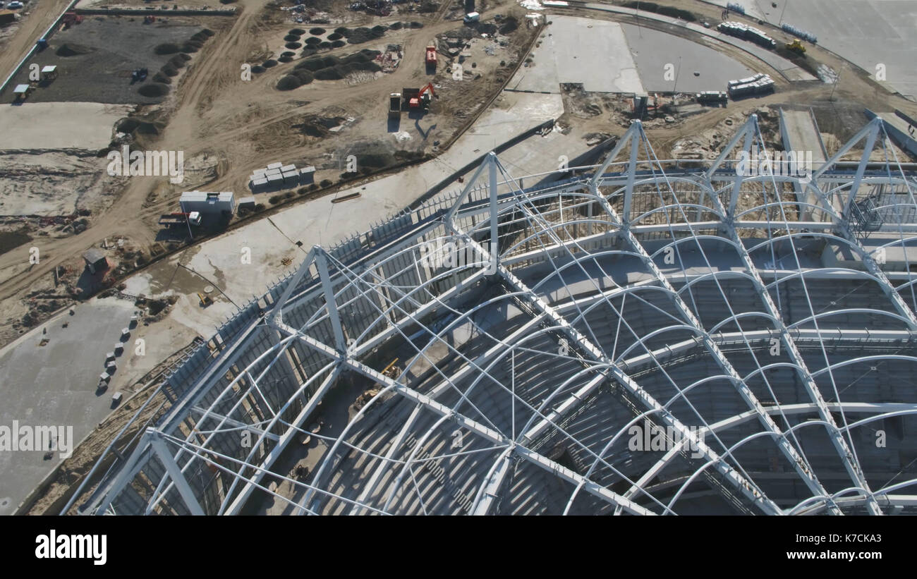 Aerial view on construction and reconstruction of football stadium