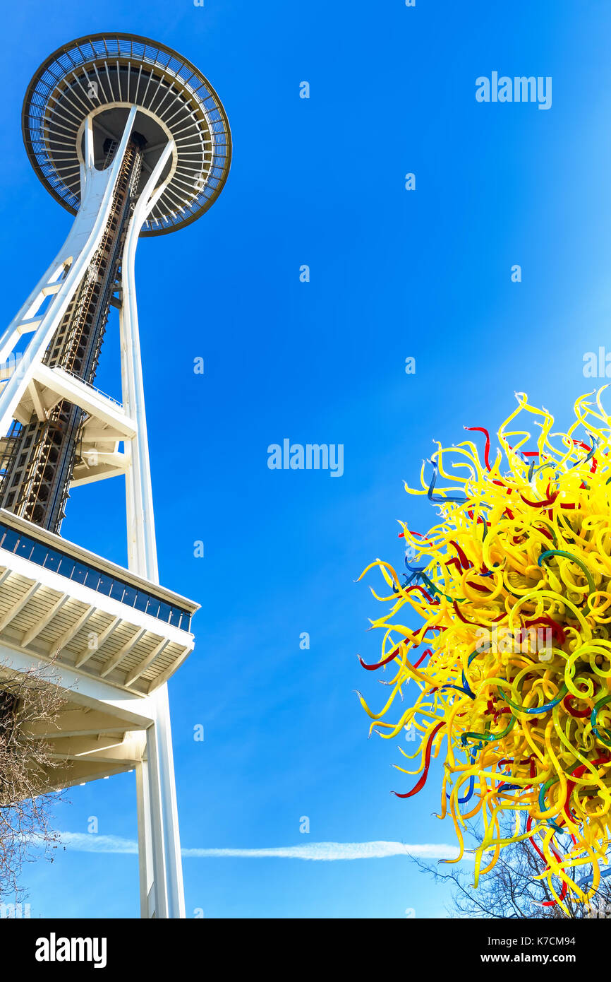 SEATTLE-DEC 1, 2014: Unique perspective of two Seattle icons, the Space Needle and the Dale Chihuly Garden and Glass Museum next door, with a glass sc Stock Photo