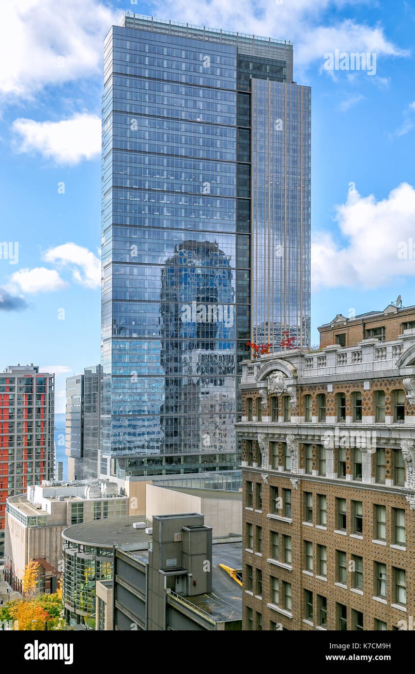 SEATTLE-OCT 27, 2013: The city's downtown district on University Avenue features a mix of new and old architecture, with glass towers reflecting neigh Stock Photo