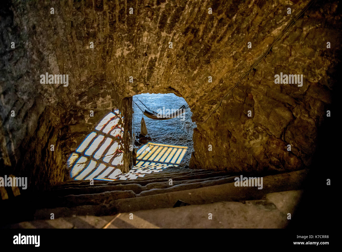 A sleeping hammock in Edinburgh castle prison dungeon, Scotland Stock Photo
