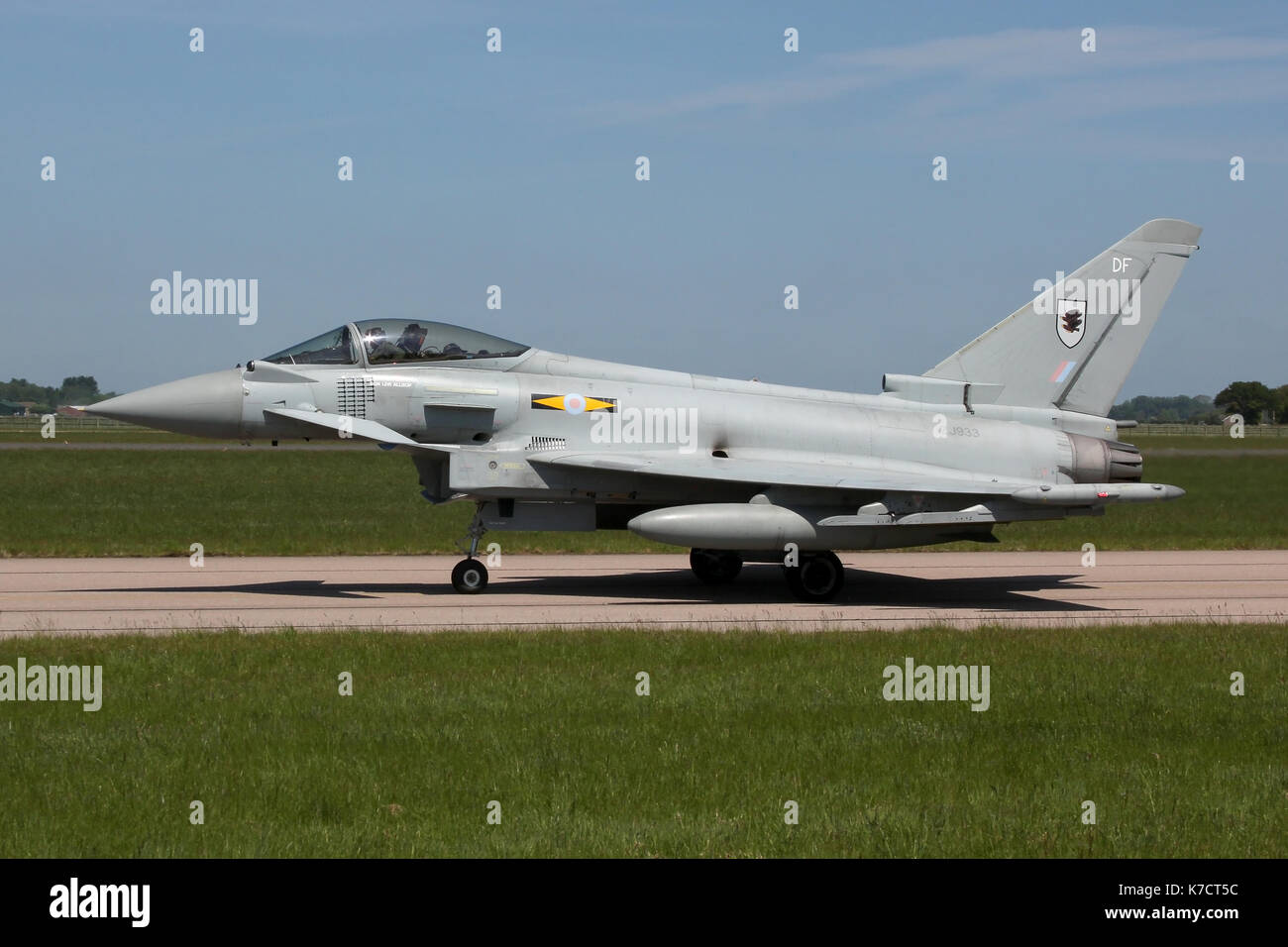 11 Squadron Typhoon taxiing back to the Coningsby shelters. Aircraft still shows mission markings from Operation Ellamy and sorties over Libya. Stock Photo