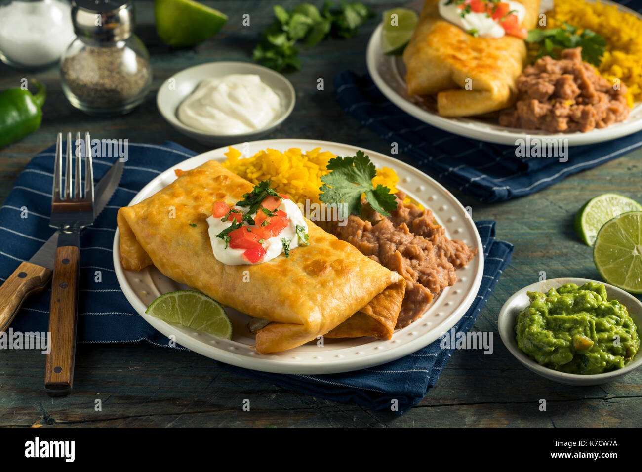 Deep Fried Beef Chimichanga Burrito with Rice and Beans Stock Photo