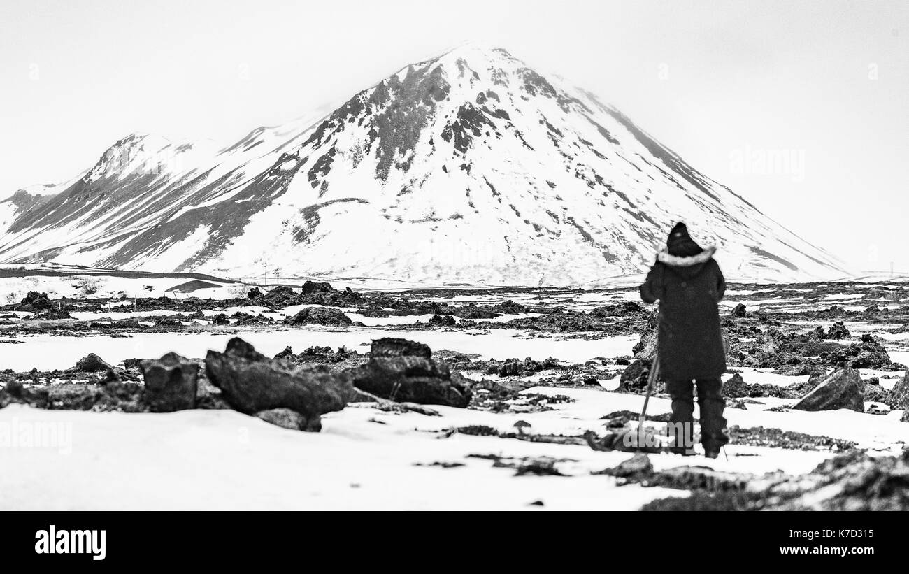 Solitary Photographer Composing His Image Of  The Volcanic Region Of Iceland Stock Photo