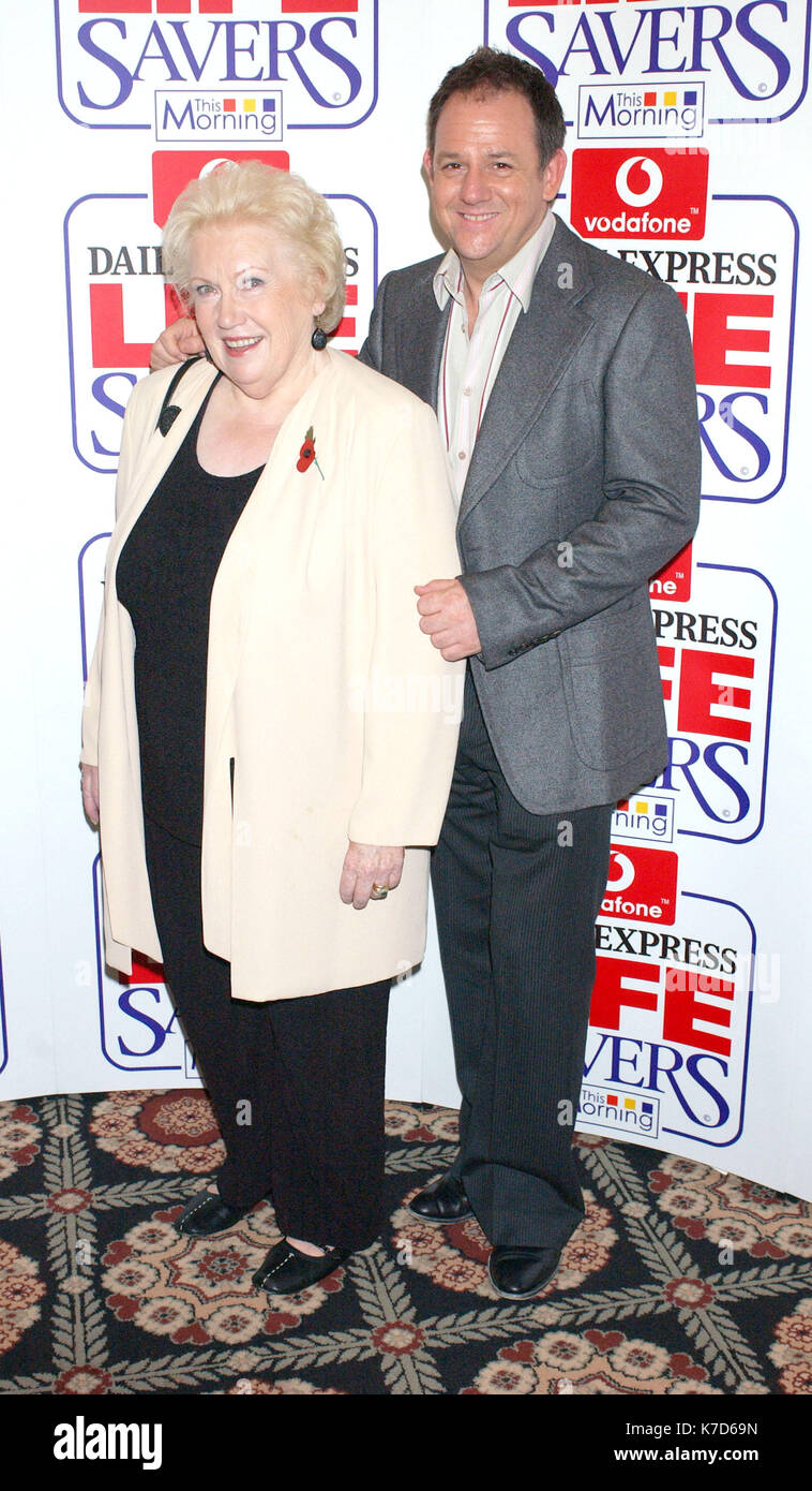 Photo must be credited ©Alpha Press 056391 11/11/04 Denise Robertson and friend Vodafone Life Savers Awards 2004 held at the Savoy Hotel in London Stock Photo