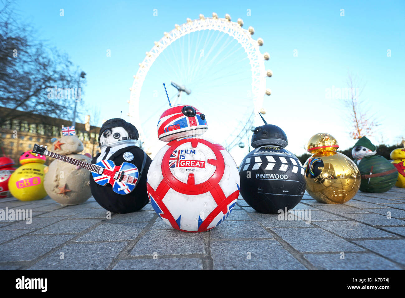 Photo Must Be Credited ©Alpha Press 065630 18/04/2016 Celebrity Designed BB-8s Line Up for London Charity Exhibition. A congregation of model droids inspired by BB-8 from Star Wars: The Force Awakens and designed by stars of the film and British celebrities, descend on London ahead of an exhibition opening tomorrow to coincide with the Blu-ray and DVD release of the film.Ê The miniature BB-8 models have been designed by celebrities including Mark Hamill, John Boyega, Daisy Ridley, Anthony Daniels, Warwick Davis, Simon Pegg, Jonathan Ross, Years and Years, Alex Brooker and Paddy McGuinness and  Stock Photo