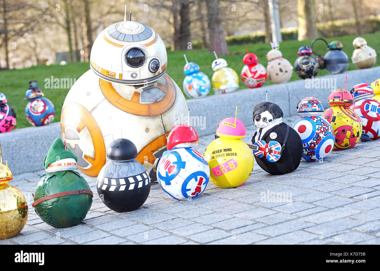 Photo Must Be Credited ©Alpha Press 065630 18/04/2016 Celebrity Designed BB-8s Line Up for London Charity Exhibition. A congregation of model droids inspired by BB-8 from Star Wars: The Force Awakens and designed by stars of the film and British celebrities, descend on London ahead of an exhibition opening tomorrow to coincide with the Blu-ray and DVD release of the film.Ê The miniature BB-8 models have been designed by celebrities including Mark Hamill, John Boyega, Daisy Ridley, Anthony Daniels, Warwick Davis, Simon Pegg, Jonathan Ross, Years and Years, Alex Brooker and Paddy McGuinness and  Stock Photo