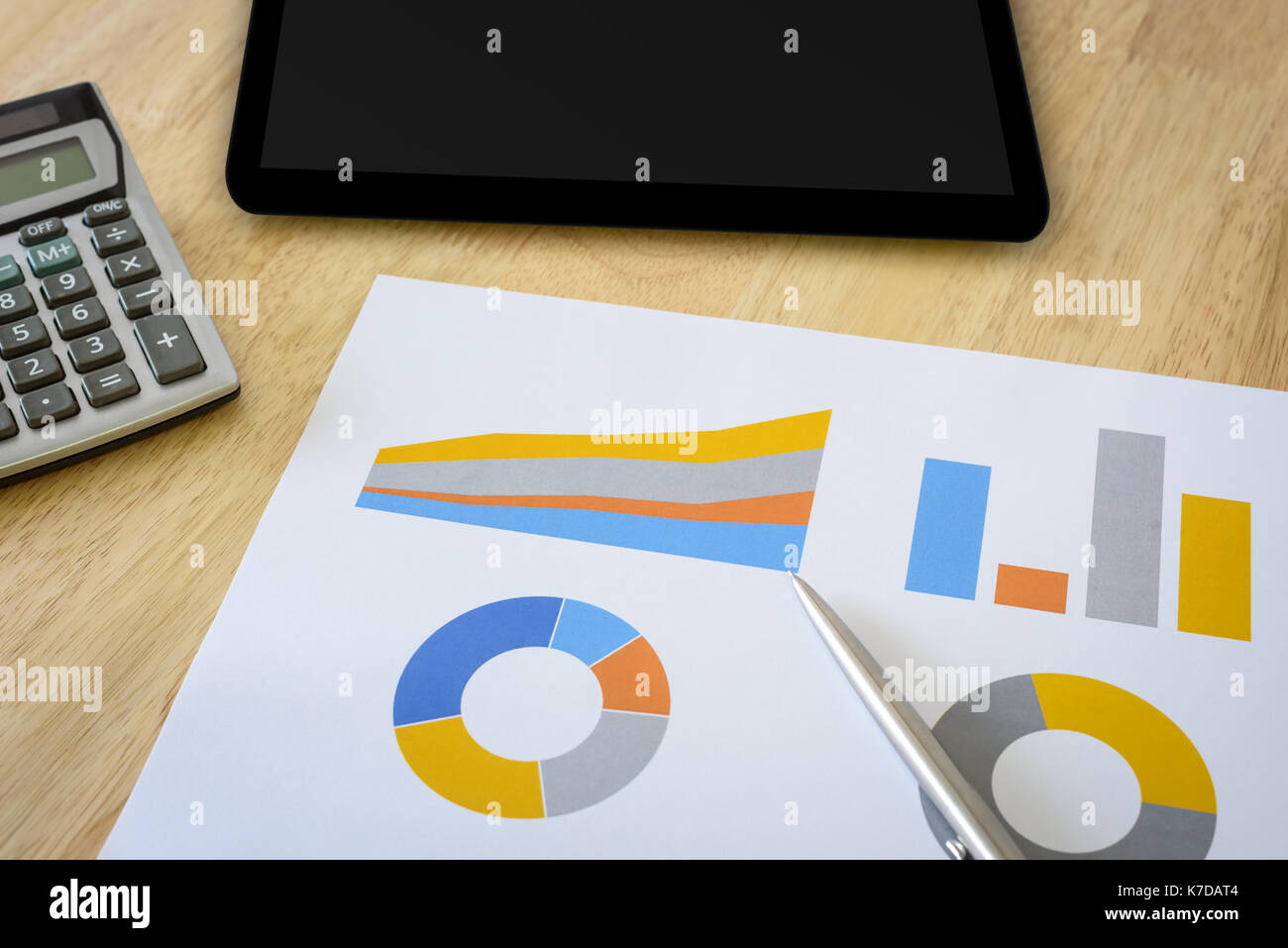 financial chart with calculator and digital tablet Stock Photo