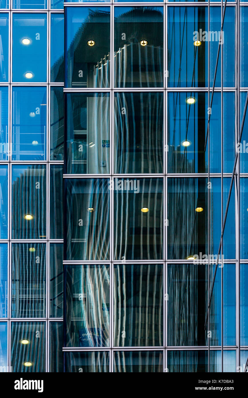 The Iconic Tower 42 Reflected On The Front Of A City Of London Building, London, UK Stock Photo