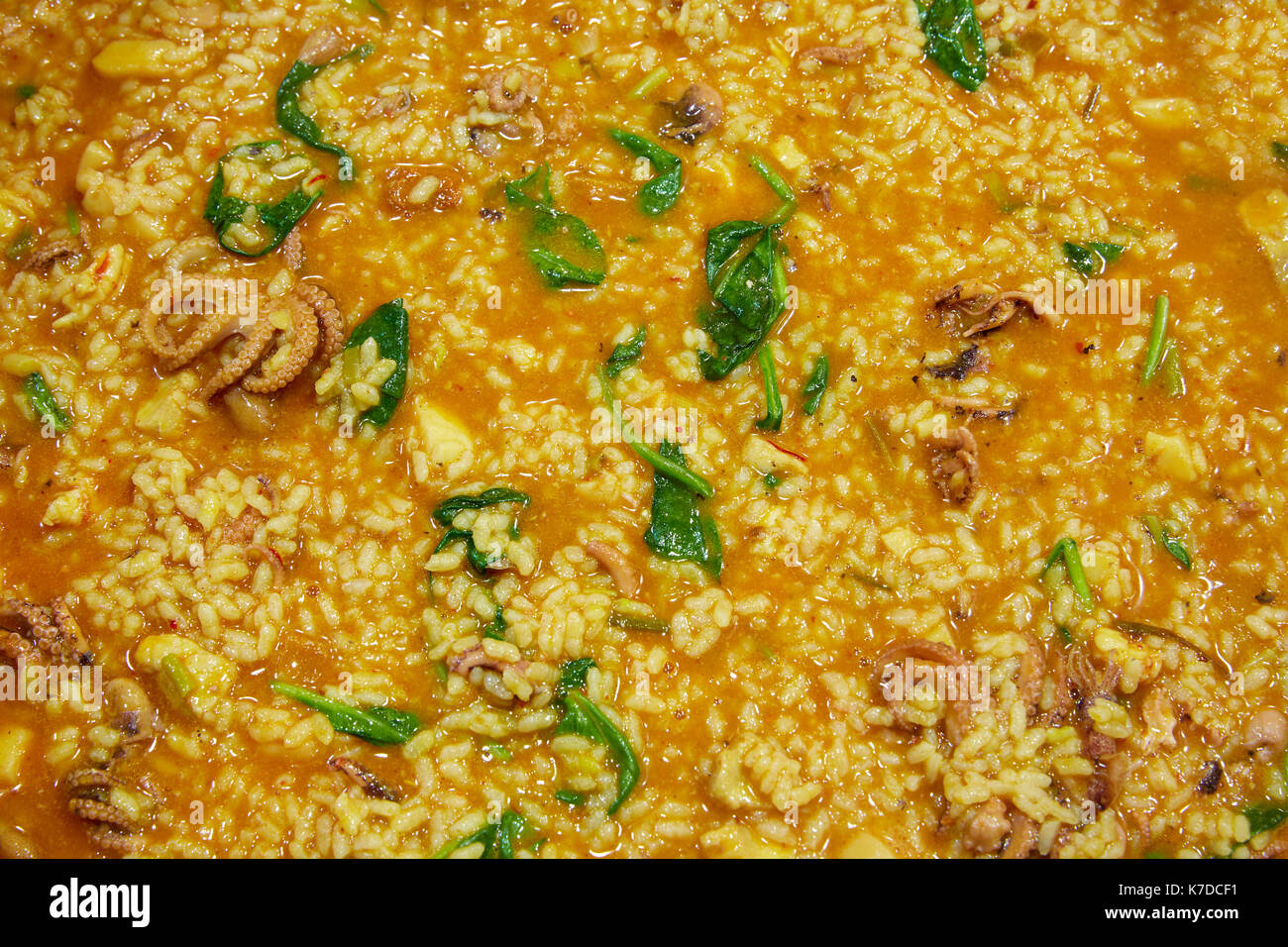 Little octopus rice with spinach and squash recipe Stock Photo - Alamy
