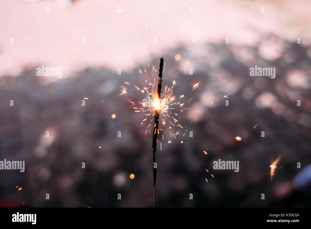 Close-up of lit sparkler during dusk Stock Photo