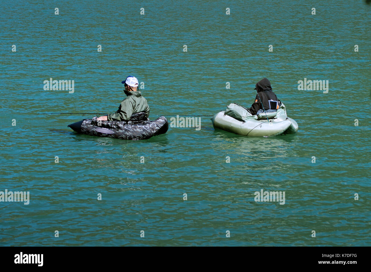 Fisherman floating on a Scottish Loch using a float tube. SCO 9129 Stock  Photo - Alamy