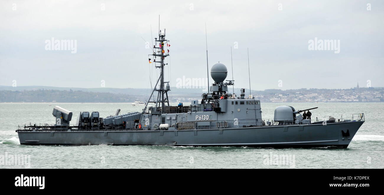AJAXNETPHOTO. 1ST MAY, 2015. PORTSMOUTH, ENGLAND. - COLD WAR VETERANS VISIT - GERMAN NAVY GEPARD FAST ATTACK CRAFT TYPE 143A HYAENE (P6130) OF THE 7TH FAST PATROL BOAT SQUADRON ENTERING PNB. VESSELS WERE LAST OF THE TYPE BUILT IN THE 1990S ARMED WITH EXOCET ANTI-SHIP MISSILES DUE FOR DECOMISSION IN 2020. PHOTO:TONY HOLLAND/AJAX REF:DTH150105 37877 Stock Photo