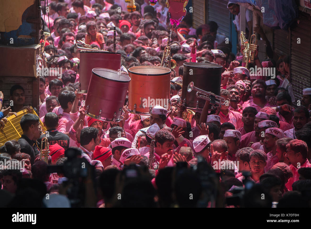 The image of Devotees dancing for Ganpati or Elephant headed lord  on the way to immersion at lalbaug, .Mumbai, India Stock Photo