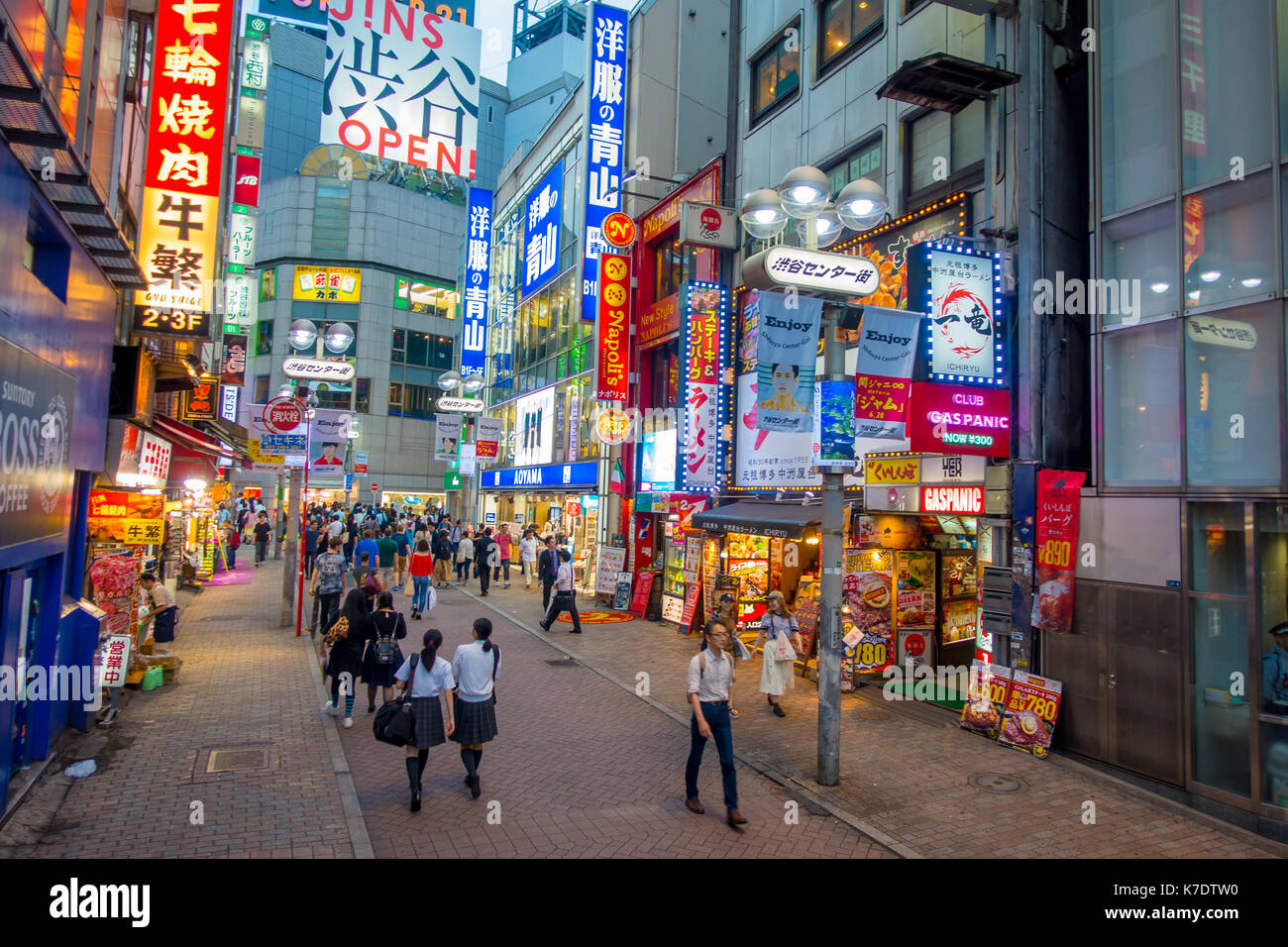 TOKYO, JAPAN JUNE 28 - 2017: Crowd of people in Shopping street near Shibuya, is one of Tokyo's most colorful and busy districts, packed with shopping, dining and nightclubs Stock Photo