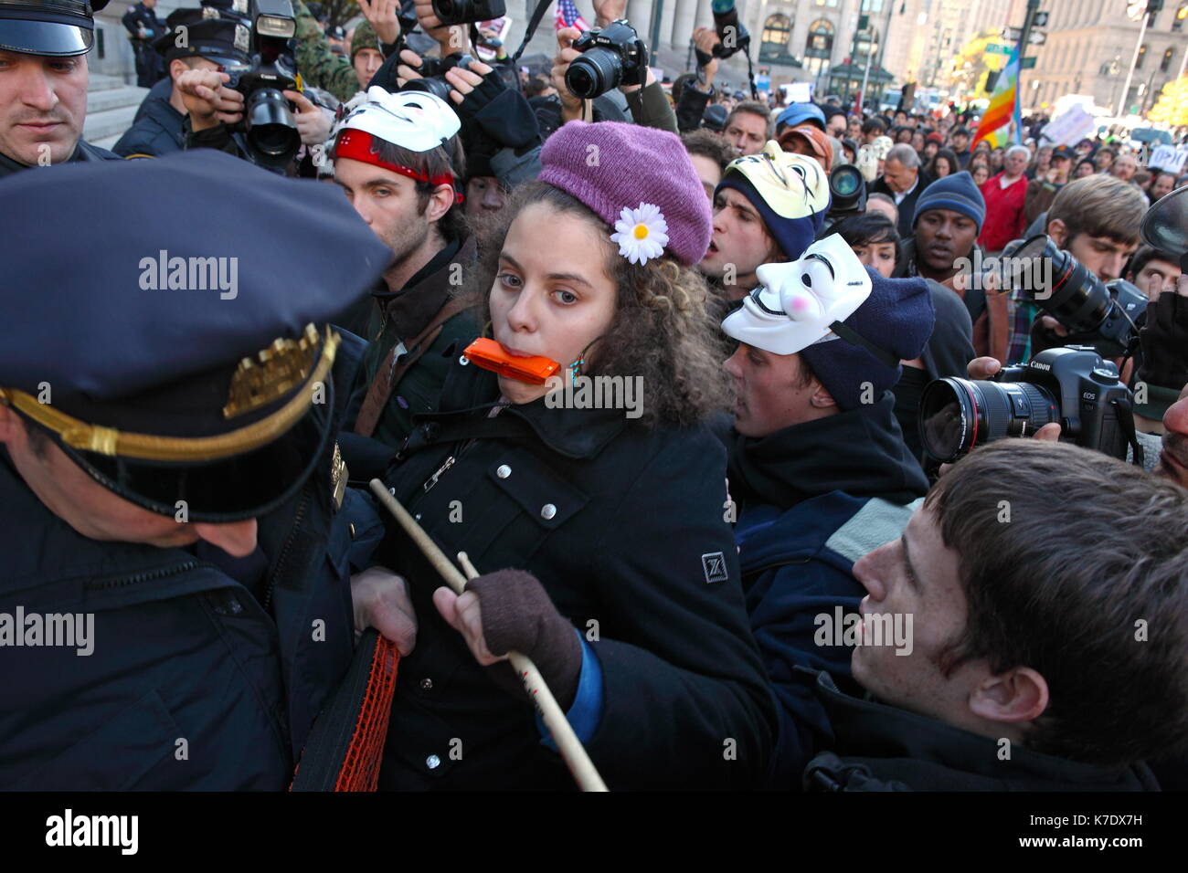 NYPD officers prohibit freedom of assembly on the steps of the New York County Supreme Court at Foley Square on November 5, 2011. Protestors marched f Stock Photo