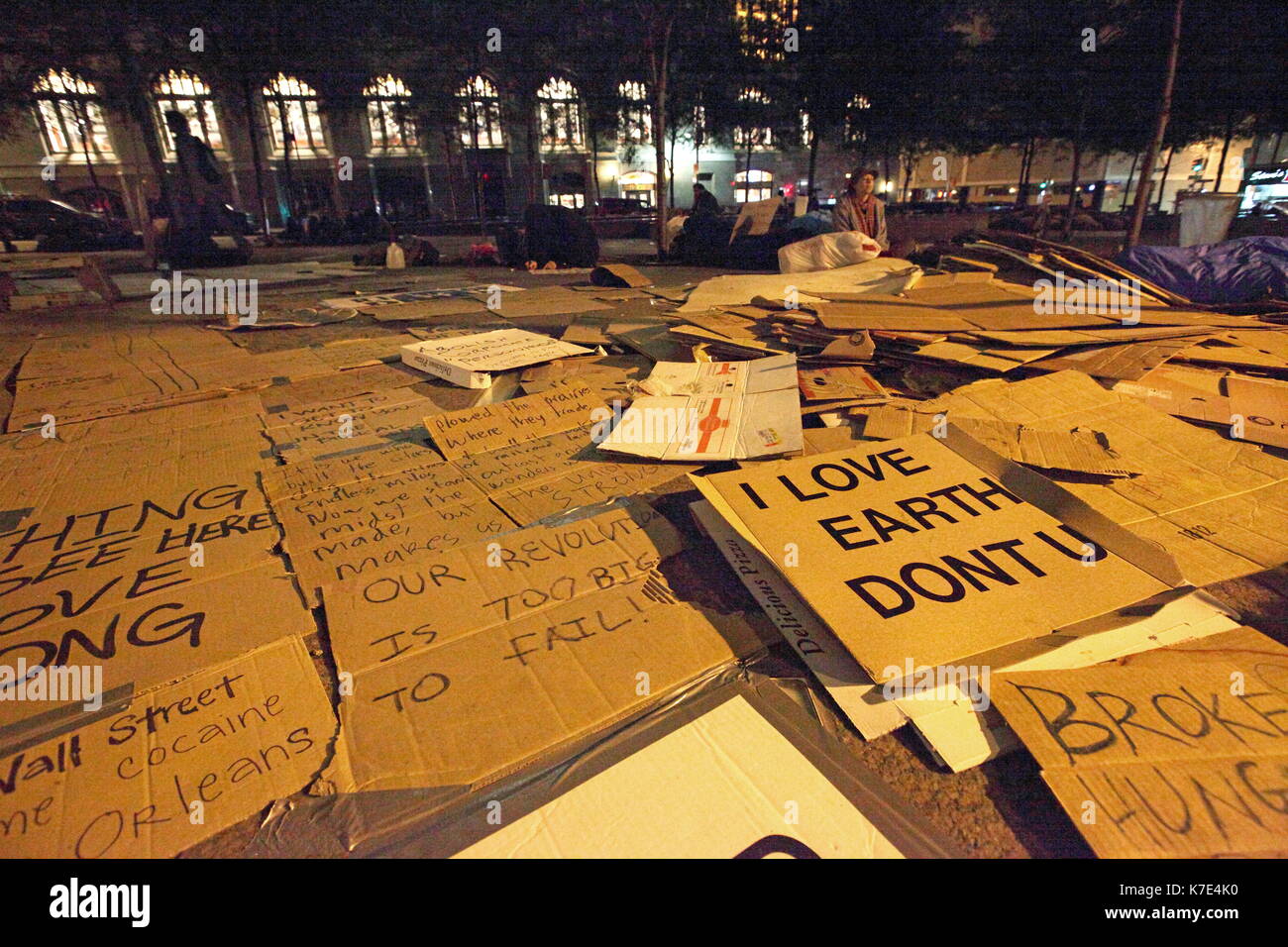 Cardboard signs are arranged at the 'Occupy Wall Street' movement at Trinity Place, New York on September 17, 2011. Stock Photo