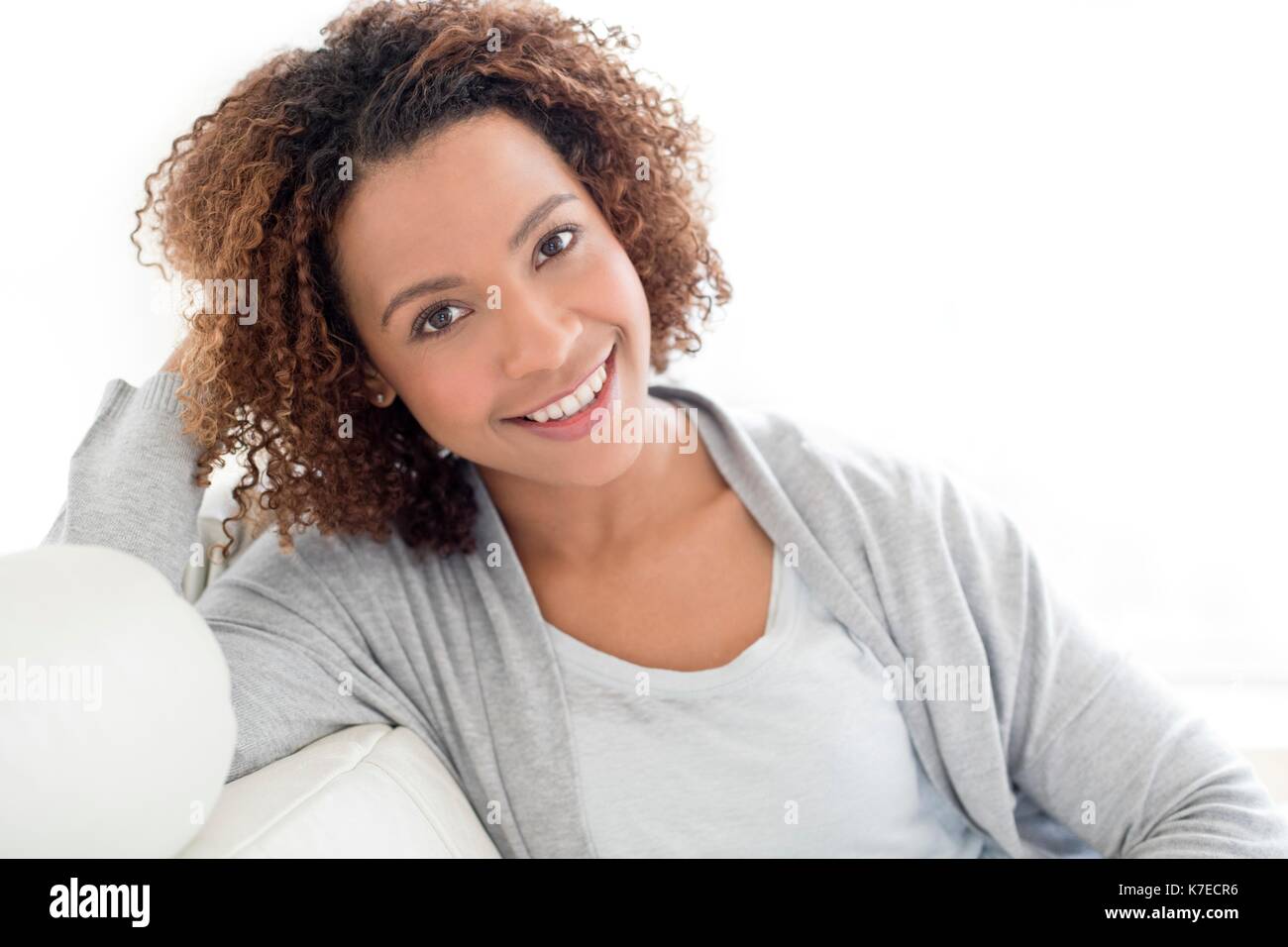 Portrait of mid adult woman smiling. Stock Photo
