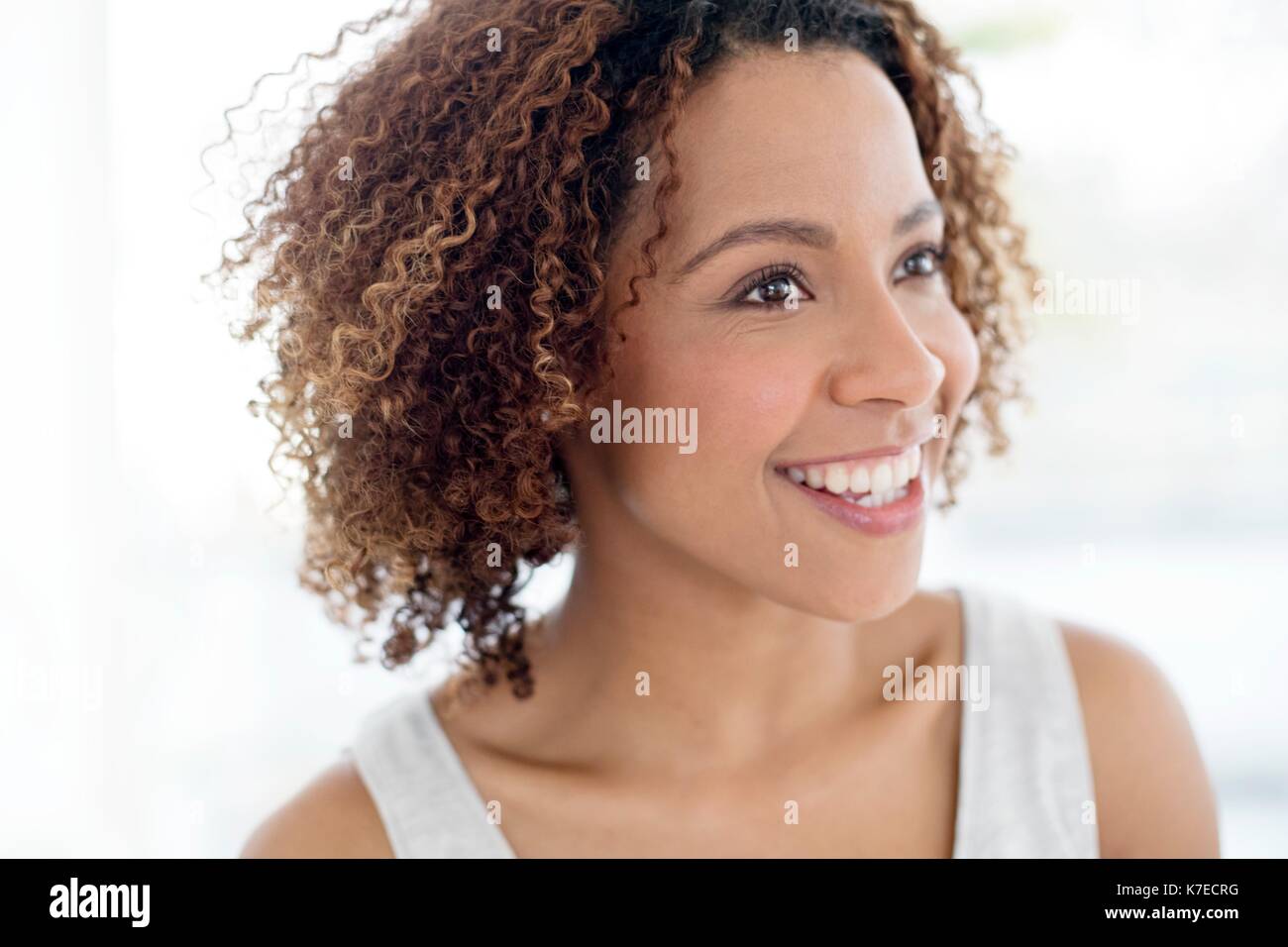 Portrait of mid adult woman smiling. Stock Photo