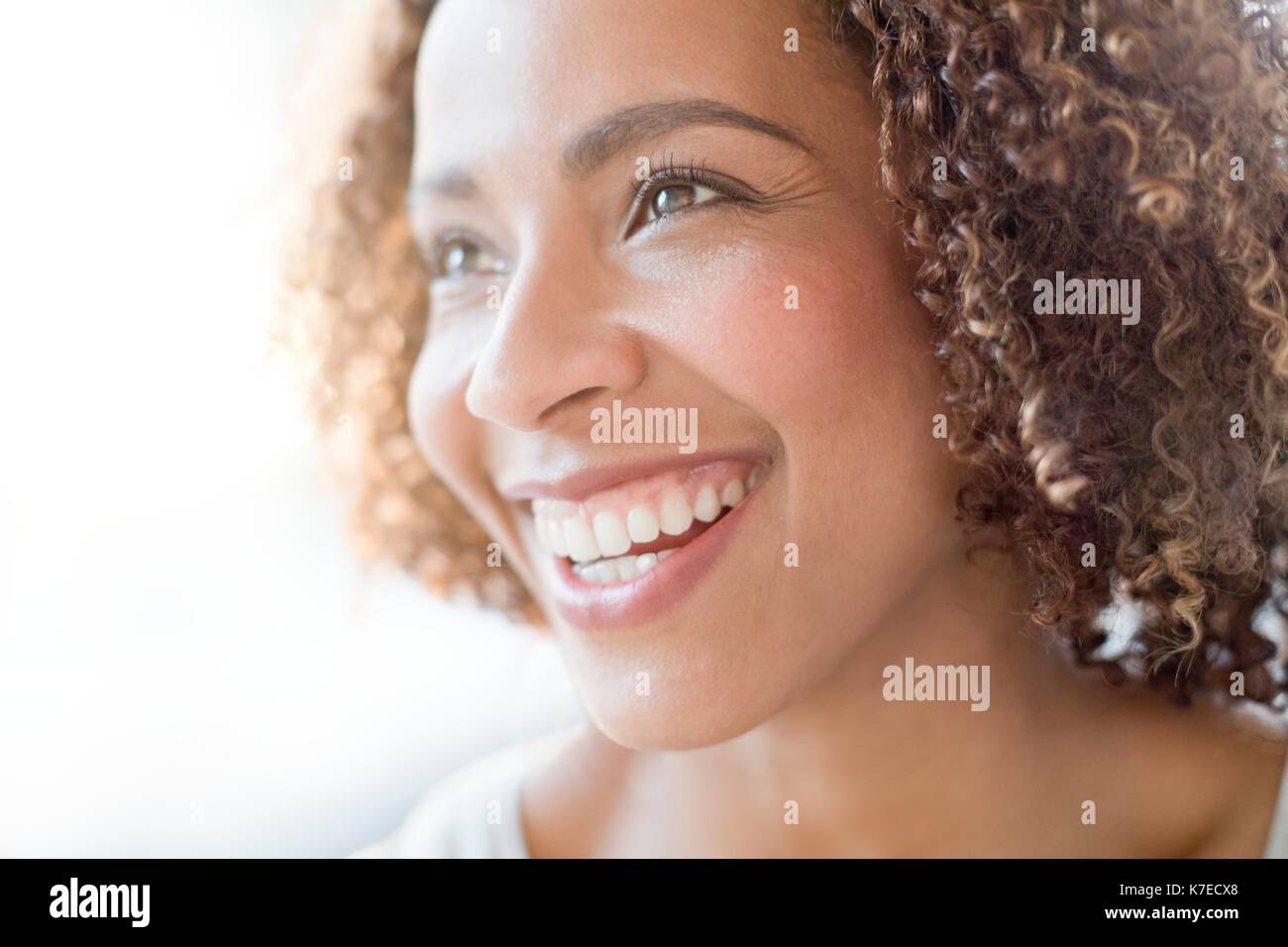 Portrait of mid adult woman smiling. Stock Photo