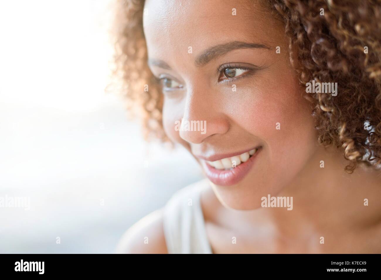 Portrait of mid adult woman smiling. Stock Photo