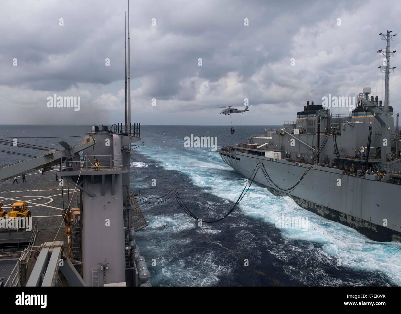 The dock landing ship USS Oak Hill (LSD 51) conducts a replenishment-at-sea Stock Photo