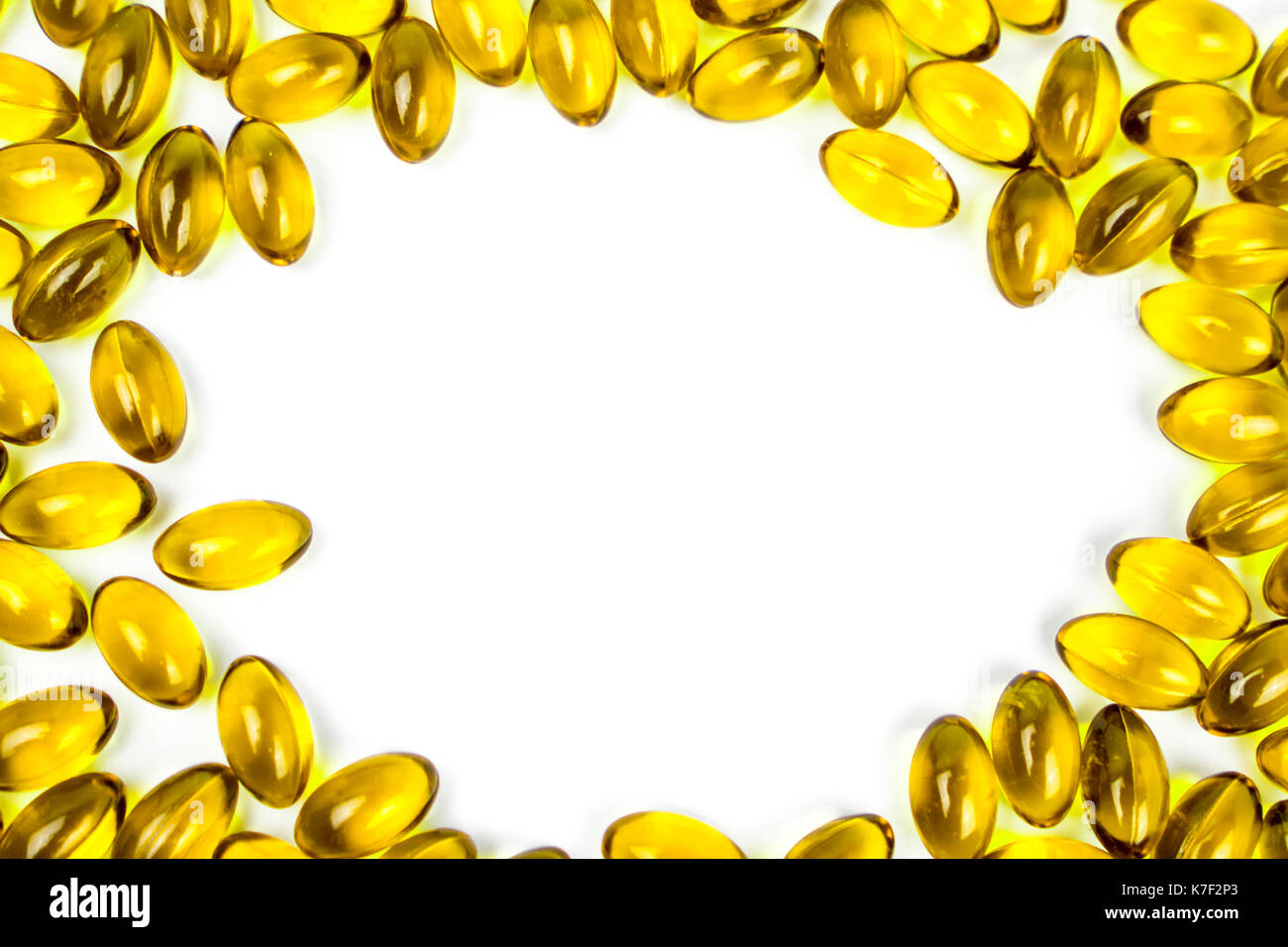 Fish oil in soft gelatin capsule isolated on white background with copy
