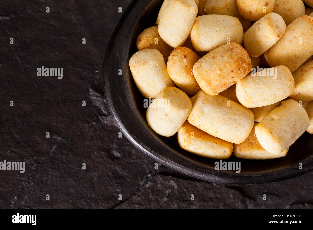 Traditional snack from Colombia called achira on black background Stock Photo