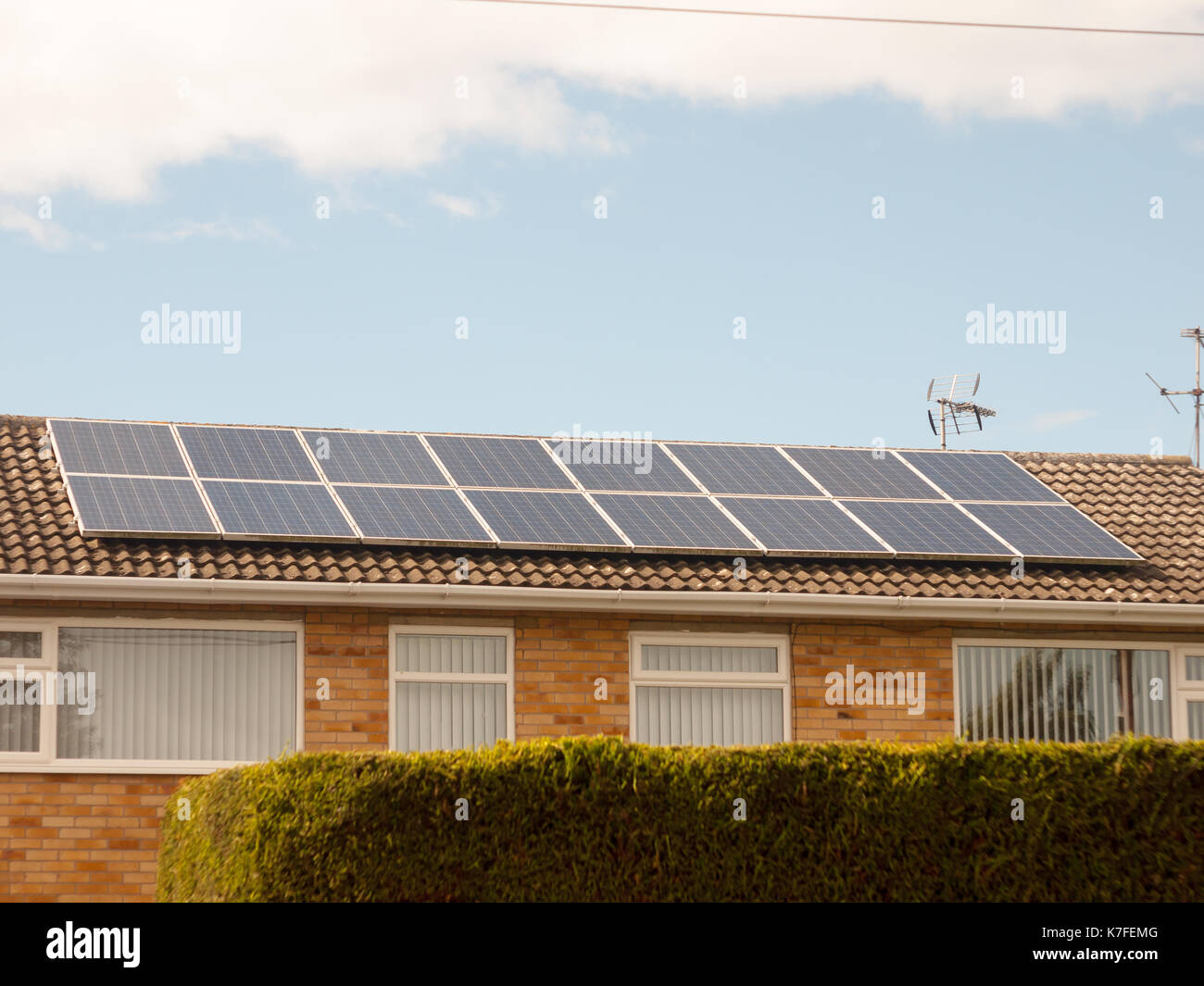 close up of solar panels on top of roof home; England; UK Stock Photo ...