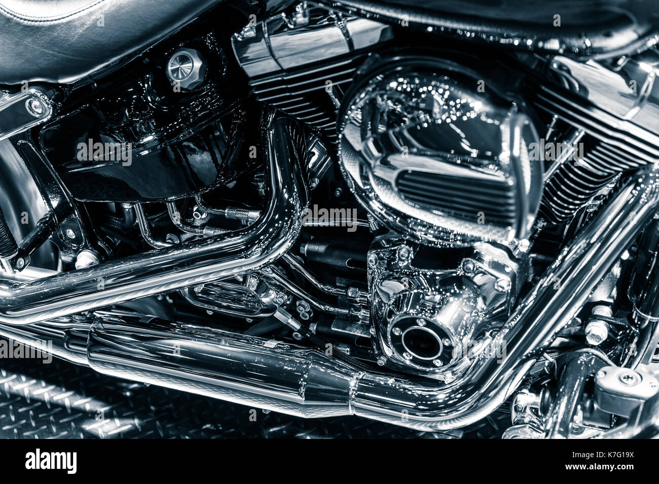 Motorcycle chromium engine exhaust pipes art photography in black and white vintage tone Stock Photo