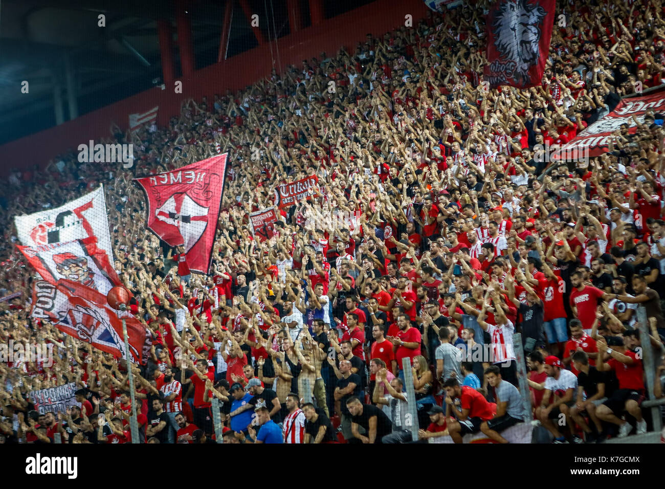 Piraeus, Greece - Sempteber 12, 2017: Olympiacos fans celebrating for their  team during the UEFA Champions League game between Olympiacos vs Sporting  Stock Photo - Alamy