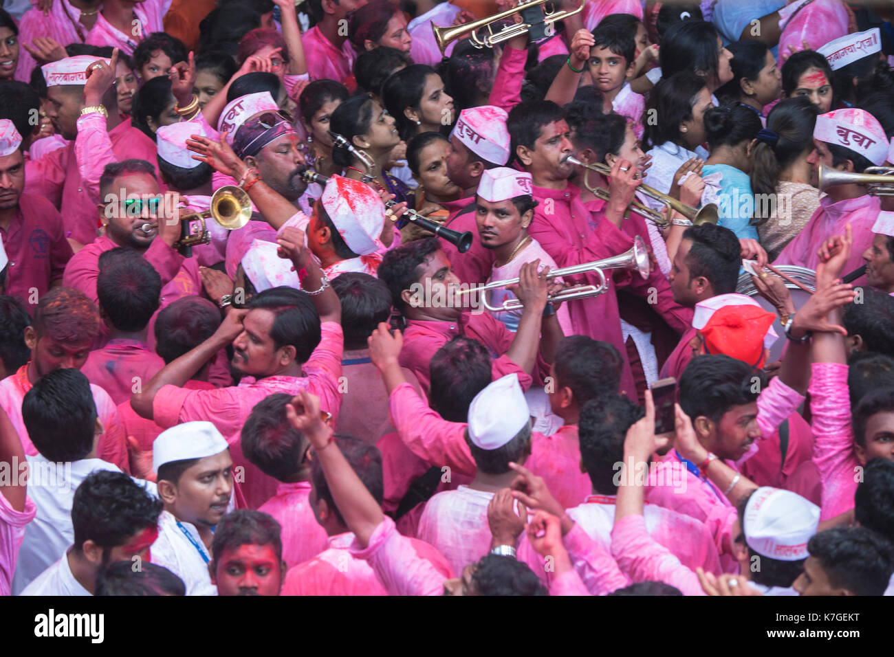 The image of Devotees dancing with music for Ganpati or Elephant headed lord  on the way to immersion at lalbaug, .Mumbai, India Stock Photo
