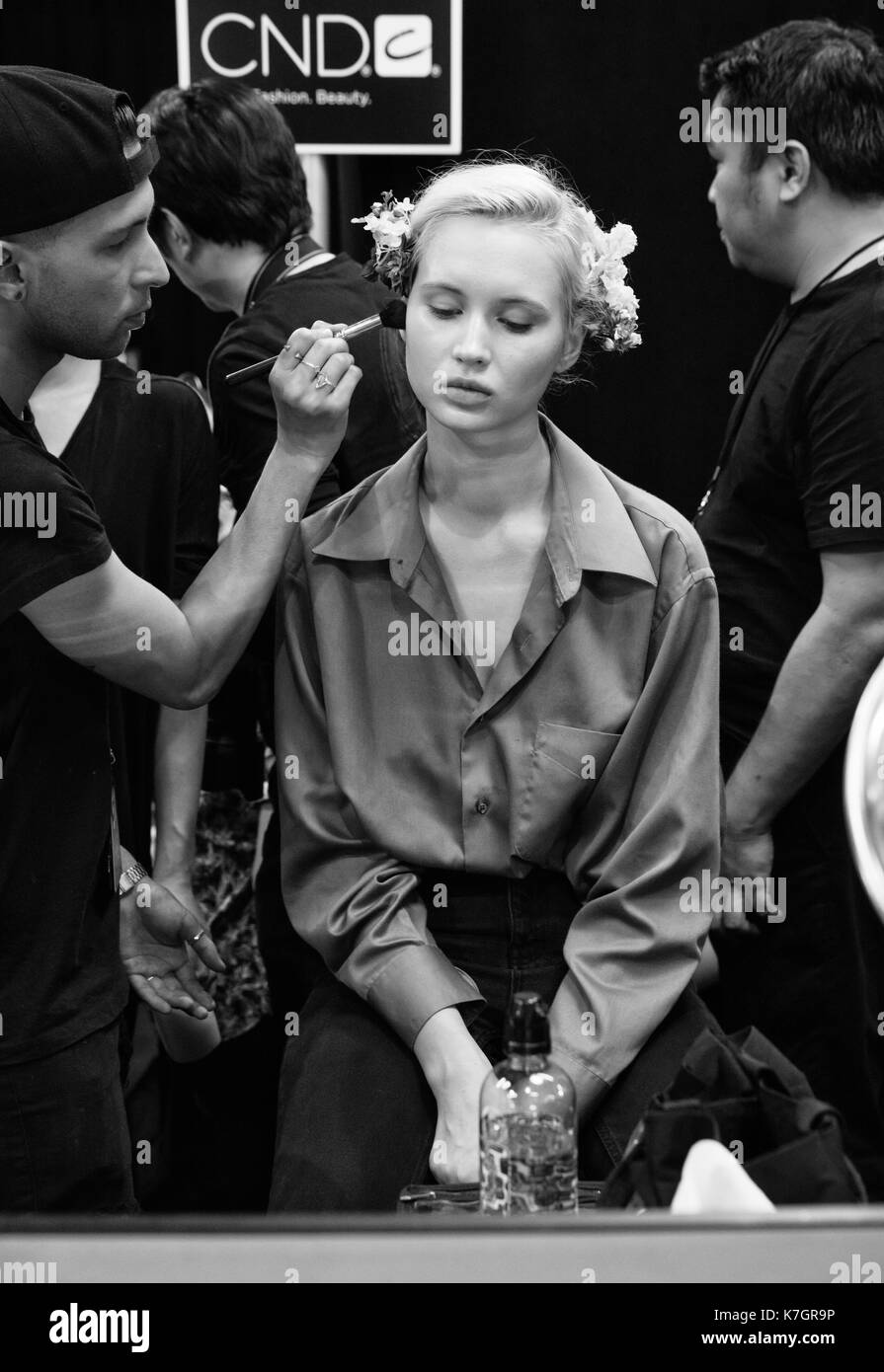 NEW YORK, NY - September 12, 2017: A model prepares backstage for The Blonds Spring Summer 2018 fashion show during New York Fashion Week Women's Stock Photo