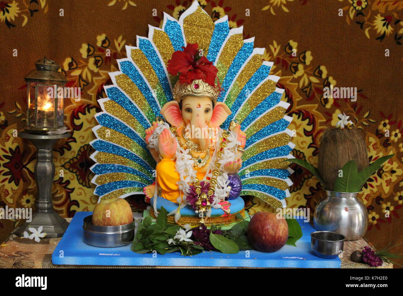 An home Idol of Lord Ganesha along with the decorations during 10 days Ganesh Festival celebrated in Maharashtra, India. Stock Photo